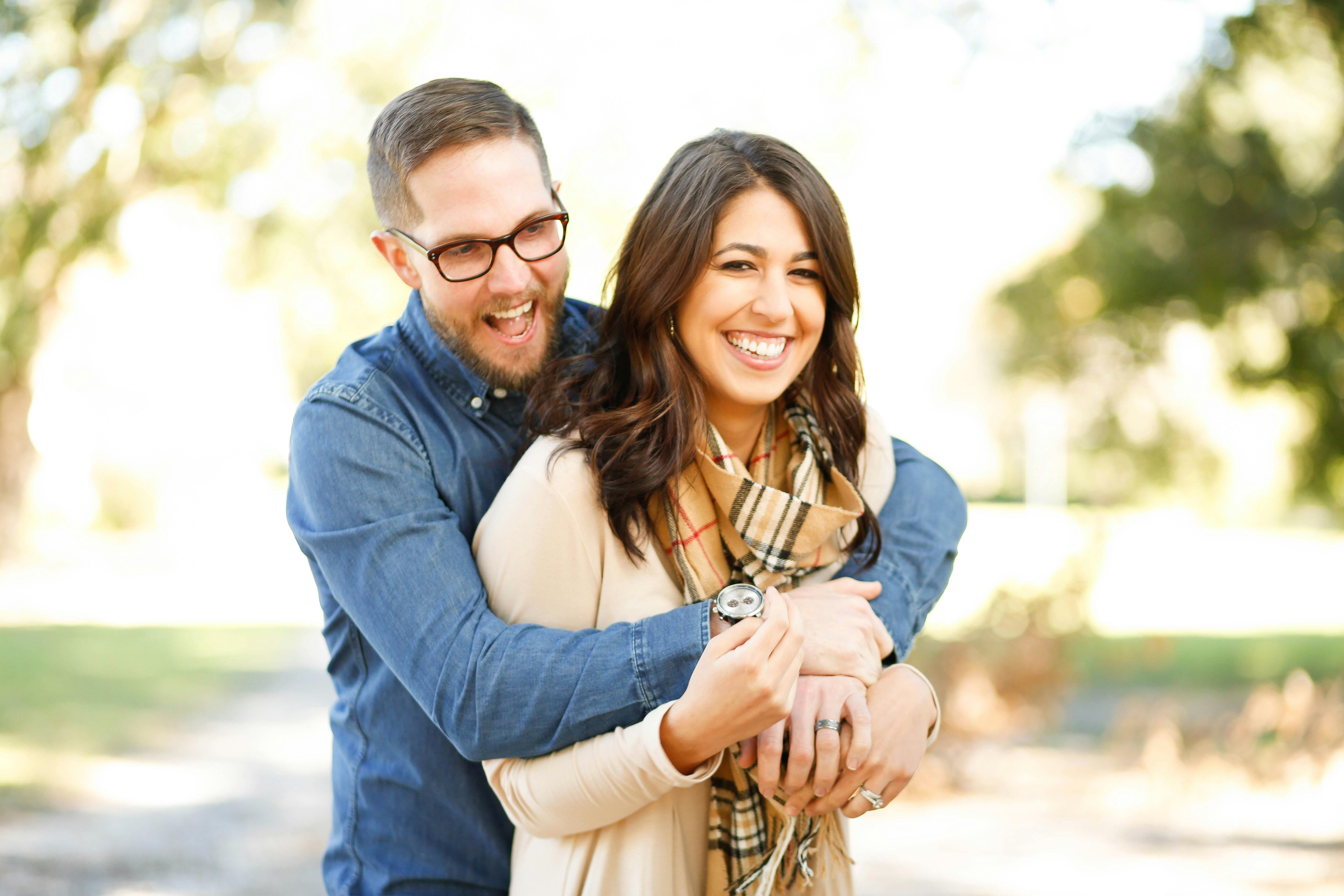 young couple sitting on floor